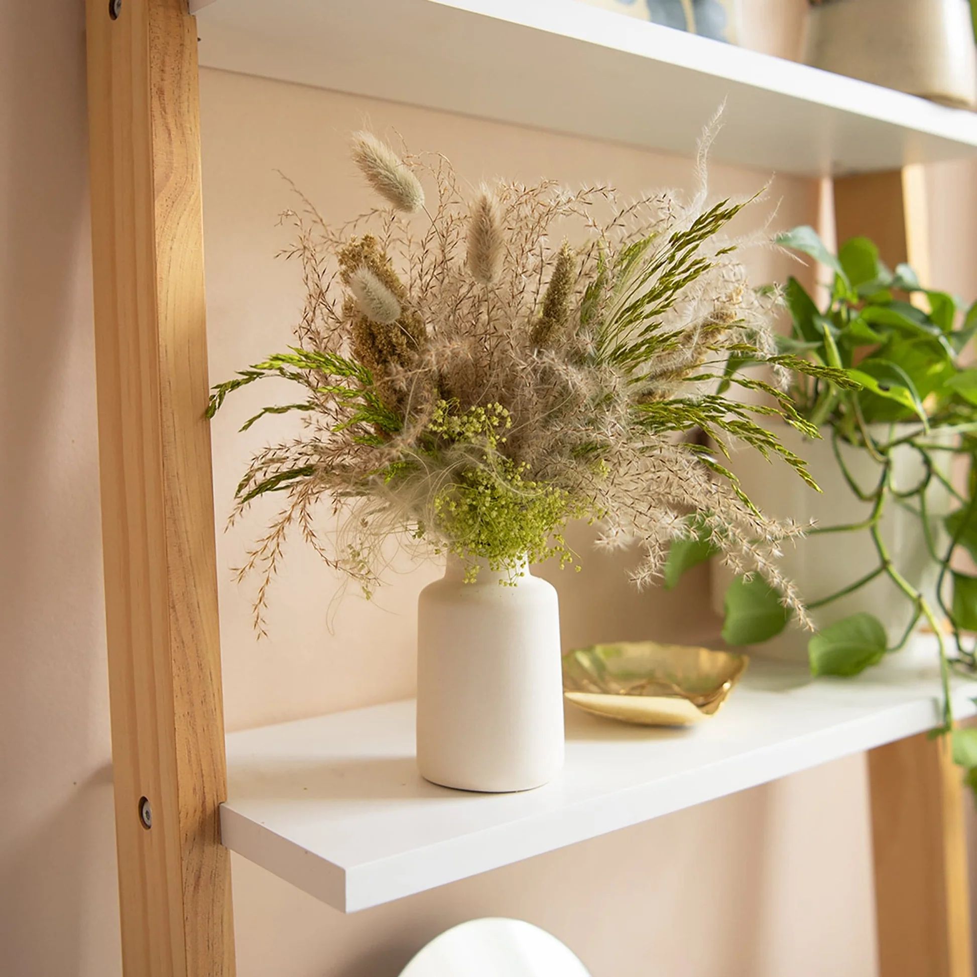 dried flowers in shelf display