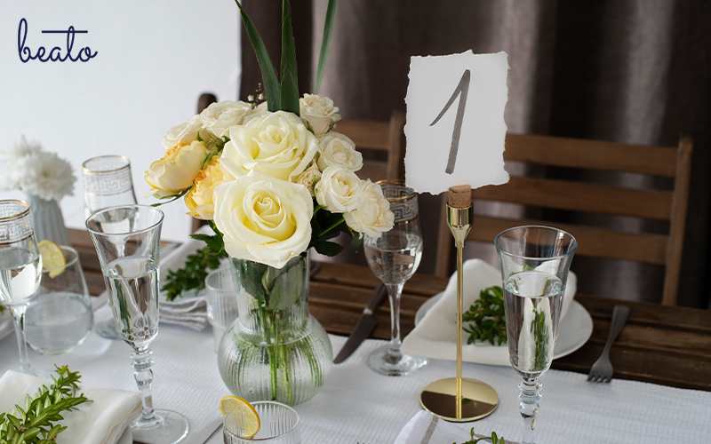 Beautifully arranged flowers at wedding table