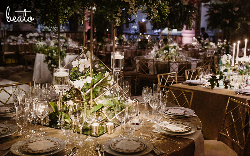 Bouquet surrounded by champagne glasses
