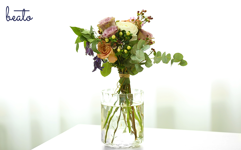 Bouquet of flowers kept in a glass vase